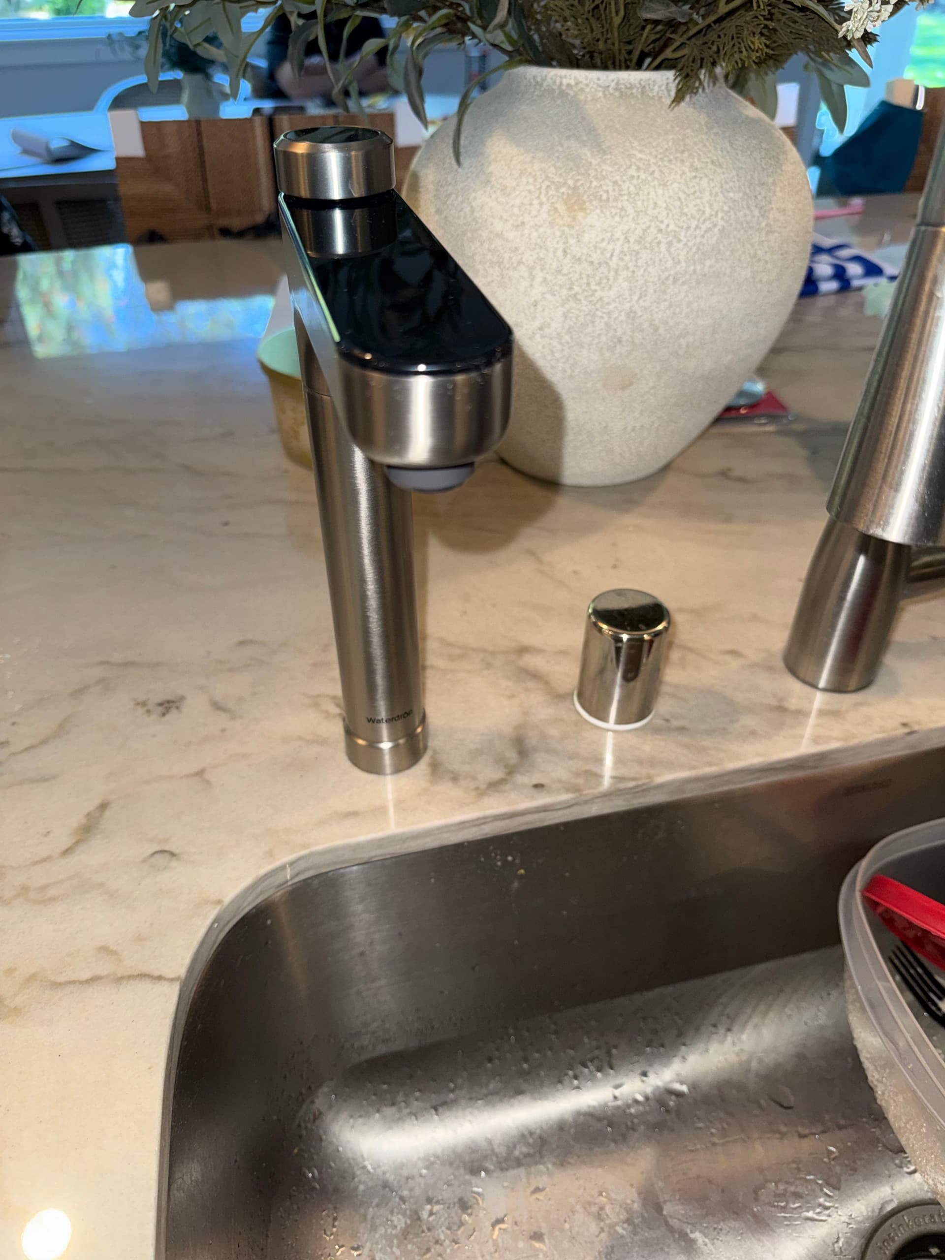 Reverse Osmosis System and Filtered Water Faucet Installed on Marble Countertop image