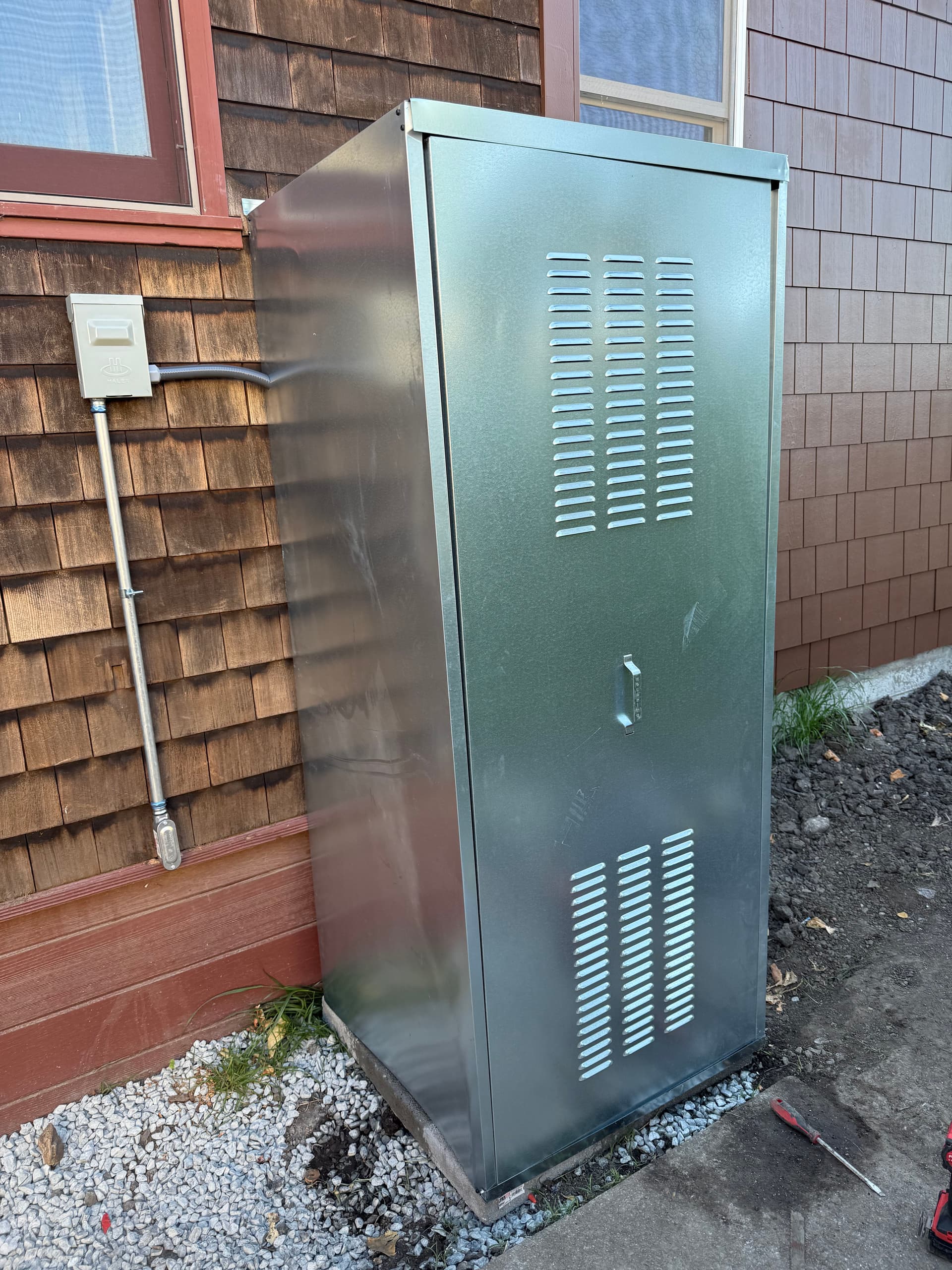 Heat Pump Water Heater Install with Custom Protective Enclosure image